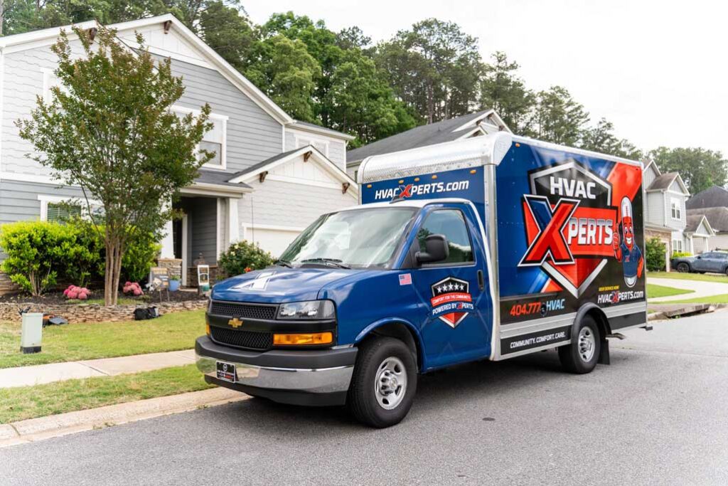 Hvac Xpert box truck in neighborhood